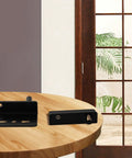 Pair Of Heavy Duty Iron Hinges With Bushings And Protective Plastic Caps Perfect For Wooden Doors Kitchen Cabinets And Furniture on a wooden table.