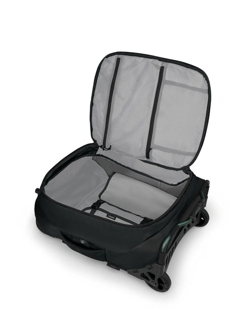 Osprey Ozone 2-Wheel carry-on luggage, black exterior, open to show grey interior with mesh lid and dividers.