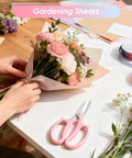 Four Piece Flower Scissors Set With Stainless Steel Blades And Comfort Grip Handles for bouquet arranging on table