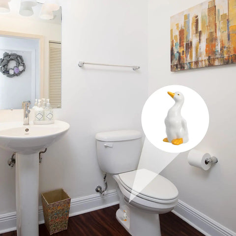 Adorable Ceramic Duck Toilet Bolt Covers Two Pack Decorative Screw Caps With Slick White Finish And Universal Fit in bathroom.