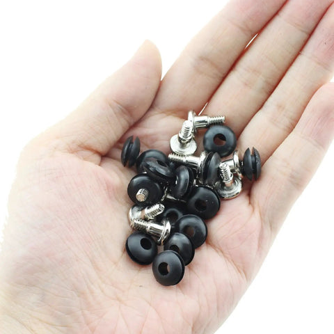Hand holding 20 Pack Three Point Five Inch Anti Vibration Mounting Screws for PC Hard Drives Black Vibration Damping Screws