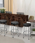 Swivel Bar Stool With Padded 14.5 Inch Seat And Chrome Plated Legs in home workshop setting