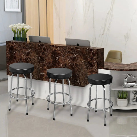 Swivel Bar Stool With Padded 14.5 Inch Seat And Chrome Plated Legs in home workshop setting