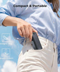 Person placing 5000mAh Fast Charging Battery Handle for Osmo Pocket 3 and 4 Power Grip in pocket, showing portability