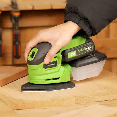 Badass 20V Cordless Detail Sander With 2 Amp Hour Battery And Twenty Sanding Discs For Smooth Wood Finishing And Zero Hassle Metal Polishing Delivering Killer 12000 RPM Power For Quick Home Projects in use on wood surface.