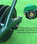Golf Ball Picker Trolley With 13 Channel Retriever Holds Up To 600 Balls frame and bearing detail on green turf