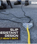 Built Tough Heavy Duty Outdoor Extension Cord 25ft With 3 Outlets 10 Gauge SJTW yellow cord on pavement next to power tool