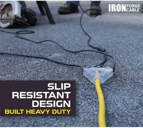 Built Tough Heavy Duty Outdoor Extension Cord 25ft With 3 Outlets 10 Gauge SJTW yellow cord on pavement next to power tool