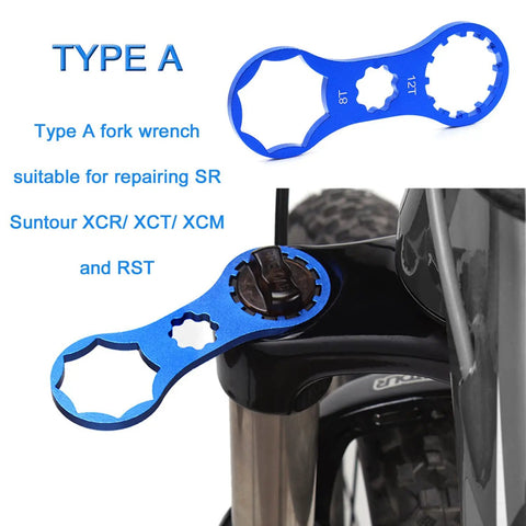 Blue aluminum alloy fork cap wrench in use for SR Suntour fork repair, part of Aluminum Alloy Fork Cap Wrench Set Two Pack Pro Grade.