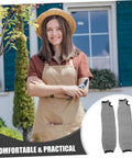 No Nonsense Cut Resistant Arm Sleeves 2 Pack PE Forearm Protectors For Welders Mechanics And Yard Crews Built Different With Snug Elastic Fit For Long Days On The Road worn by a woman holding gardening shears in a garden.
