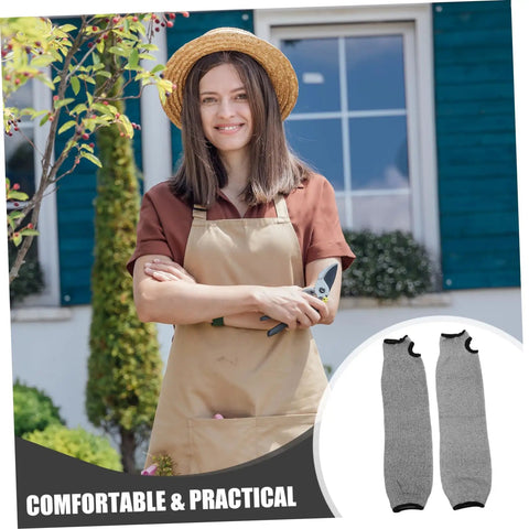 No Nonsense Cut Resistant Arm Sleeves 2 Pack PE Forearm Protectors For Welders Mechanics And Yard Crews Built Different With Snug Elastic Fit For Long Days On The Road worn by a woman holding gardening shears in a garden.