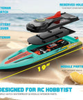Brushless RC Boat 40MPH Beast With Self Righting LED Lights 19 inch racing boat showing interior hatch design on beach