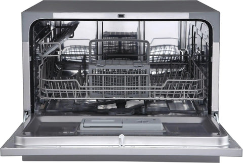 Interior view of Compact Countertop Dishwasher Featuring Stainless Tub And Seven Quick Wash Options Handles Six Place Settings No Stress In Tight Spaces Energy Star Certified Silver Machine.