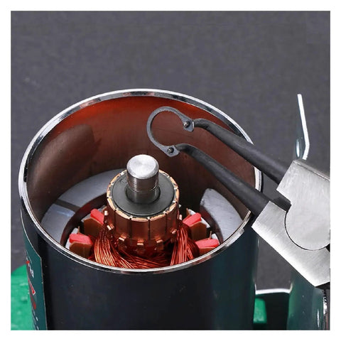 Heavy Duty C Type Shaft Retaining Rings for 6-40mm applications shown in use on motor shaft with pliers.