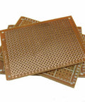Stack of Universal Paper Copper PCB Board Set 5x7cm For DIY Prototyping Matrix Style Circuit Grids, suitable for Arduino and Raspberry Pi.