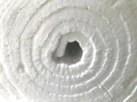 Close-up of rolled 31 By 24 By 1 Inch Ceramic Fiber Blanket Insulation 6 Pound 2300F Continuous Use Temperature for wood stoves and more.