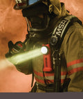 Firefighter using Survivor 175-Lumen Rechargeable Firefighter Right Angle Flashlight Intrinsically Safe Safety-Rated Orange