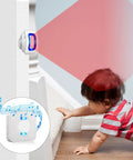 Child near wireless motion sensor LED light alarm with 500 ft range and loud chimes, 58 ringtones, 5 volume levels.