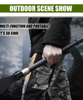 Person holding Multi Tool Pickaxe Hoe Shovel for Digging and Camping Detachable Tactical Survival Shovel in outdoor setting.