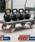 Heavy Duty Casters Set Of 4 Featuring Rock Solid Polyurethane Wheels And Cast Iron Cores For A Bump Free Roll on a flat platform cart with kettlebells.