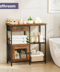 Bathroom setup with wooden and metal cabinet storing towels, toiletries, and decor next to a bathtub on a tiled floor.