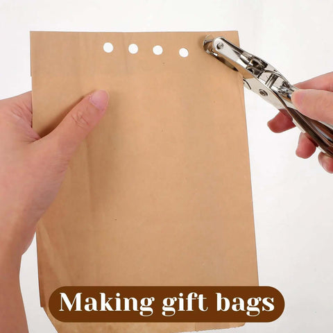 Person using Twenty Piece Metal Handheld Single Hole Punch Set One Quarter Inch Eight Sheet Capacity Circle Paper Punch Tool on paper bag