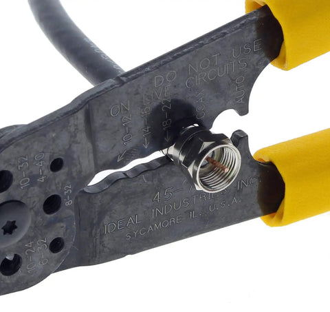 Close-up of 7 In 1 Wire Stripper And Cable Cutting Tool For Stranded Solid NM And UF Wire Pro Grade Electrician Hand Tool in use