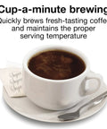 Hot coffee cup with saucer, spoon, and sugar packets emphasizing fast brewing feature of Boss Level 100 Cup Coffee Urn With Fast Brewing One Hand Dispensing Dual Heaters Brushed Aluminum Finish NSF Listed Commercial Grade For Offices Cafeterias And Big Events