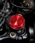 Red Aluminum Oil Filler Cap Plug Cover For Toyota Vehicles Aimed At Highlander RAV4 Yaris Camry Corolla Tacoma Land Cruiser And More Durable Stylish Engine Bay Accessory With Easy Install installed view