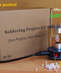 Ultrasonic Levitator Solder Practice Kit For Electronic Soldering Training with box and levitating pellets on wooden surface