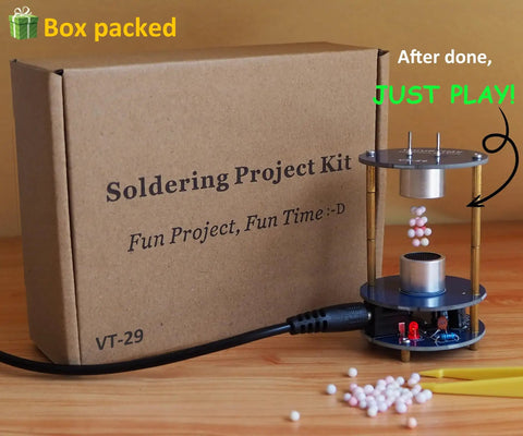 Ultrasonic Levitator Solder Practice Kit For Electronic Soldering Training with box and levitating pellets on wooden surface