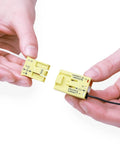 Hands holding Luminaire Disconnect Connector, 3-Pole, For Switching And Dimming Applications, Yellow, 873-903, Jar Of 100