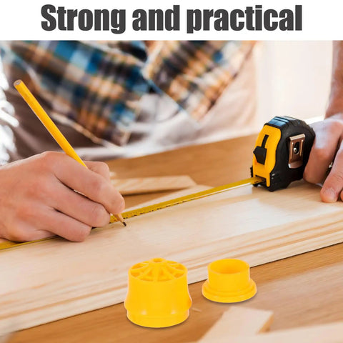 Person measuring wood with a yellow pencil using a tape measure, yellow marking tools nearby.