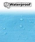 Close-up of Beefy Heavy Duty Waterproof Tarp showing water droplets on blue 12 mil thick surface with waterproof label.