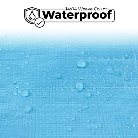 Close-up of Beefy Heavy Duty Waterproof Tarp showing water droplets on blue 12 mil thick surface with waterproof label.