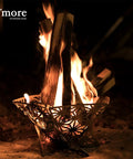 Portable Camping Fire Pit With Grill For Cooking, Outdoor Stove With Storage Bag, sturdy steel design with burning logs.