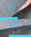 Using the drainage hole on the 34 Inch By 22 Inch Under Sink Mat Waterproof Silicone Drip Tray With Drain Hole Cabinet Protector.