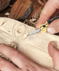 Close-up of Hardcore Tungsten Steel Scribing Chisel Set Featuring Seven Ultra Slick Blades Spanning Point One To Two Millimeters With Dead On Accuracy For Smooth Resin And Scale Model Detail Crafting used on wood.