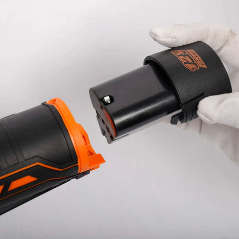Cordless Three Eighths Inch Drive Ratchet Wrench Set With 12V Battery And Charger Kit showing battery removal