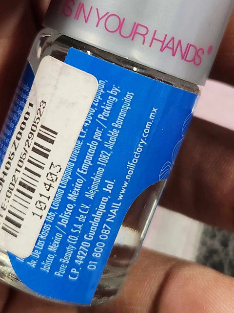 Tip Blender For Nail Tips 15Ml Softener For Acrylic And Gel Tips Helps Blend Artificial And Natural Nails Reducing Breakage And Making Application Smoother For Easier At Home Manicures. 15ml clear nail liquid bottle with blue label in hand
