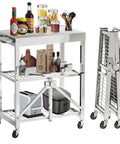 Slick Stainless Steel Folding Kitchen Cart Rock Solid Three Tier Rolling Utility Station With Grippy Locking Wheels, showcasing food prep items.