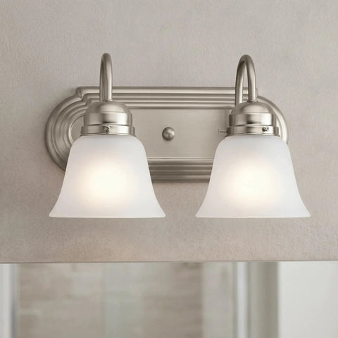 Brushed Nickel 2 Light Vanity Bath Light with Satin Etched Glass Shades, sleek modern bathroom fixture, mounted on wall.