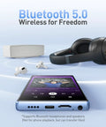 5 Inch MP3 Player With 128GB Real Storage Bluetooth And WiFi Android 13 System next to headphones and speaker