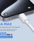 USB-C charging cable plugged into an iPhone in close-up view, white cable.