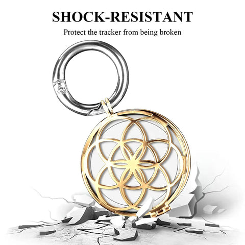 Gold Metal AirTag Protective Case And Key Ring Holder For Apple AirTag 2021 displayed on cracked surface showing shock resistance