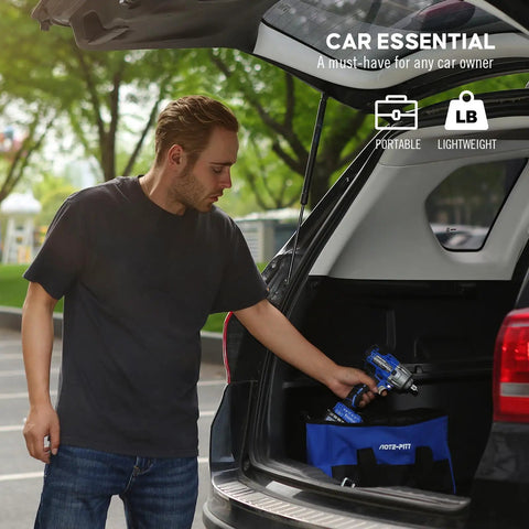 Man placing 20V Cordless Brushless Impact Wrench Kit With Beefy 370 Ft Lbs Max Torque in car trunk with tools bag