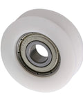 Four Pc U Groove Pom Pulleys With Eight mm Bore And 34 mm Outer Diameter, white POM roller with metal bearing, designed for smooth movement.