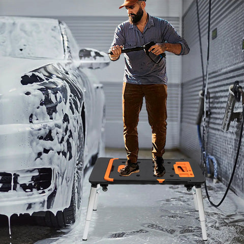 Heavy Duty Foldable Workbench With Smooth Caster Wheels Transforms Into Seven Flexible Workshop Modes Like Scaffold And Auto Repair Stand For No Sweat Garage Days And Weekend Project Hustle, used as a stable platform while washing a car.