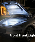 Open car trunk illuminated by Wireless Car Interior Lights 2 Pack With Motion Sensor Rechargeable 1500mAh Dome Roof Ceiling Light For Truck RV Camper And Van Trunk Lighting Magnetic Mount 2 Modes Motion Activated And Always On at night, showing bright LED light, magnetic mounted on ceiling.