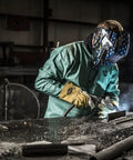 Welder wearing Goatskin and Cowhide MIG Welder Gloves Pack of 12, Kevlar-Trimmed, fleece-lined, medium, in action at metalwork.